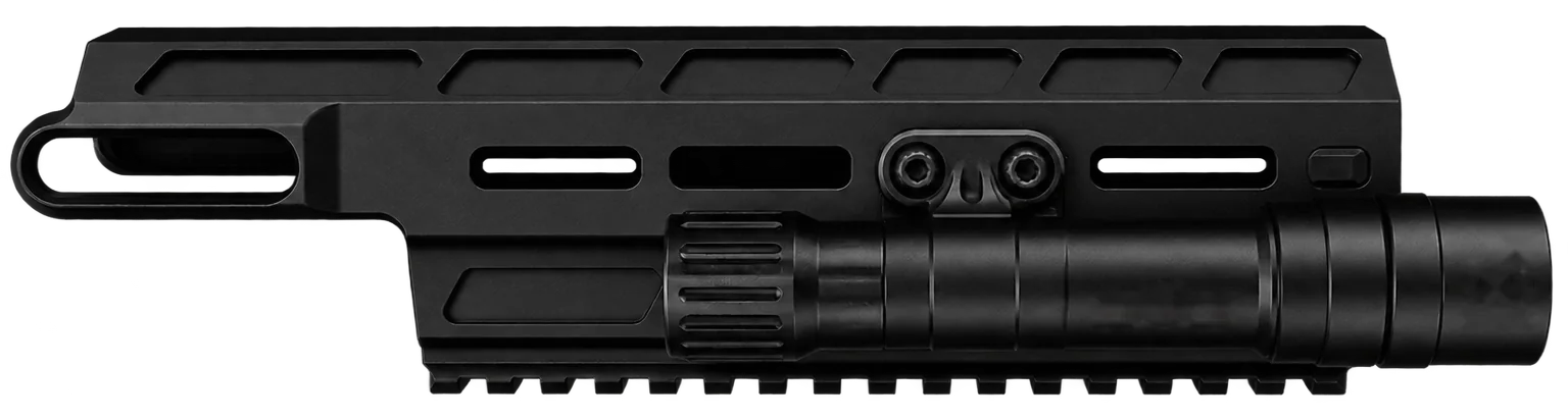 The weapon light with the wireless tailcap fitted, mounted on a rifle handguard.