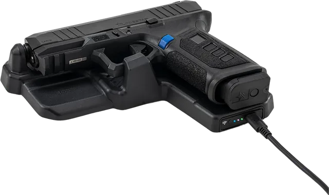 The LodeStar biometric-authorized firearm on its charging dock.