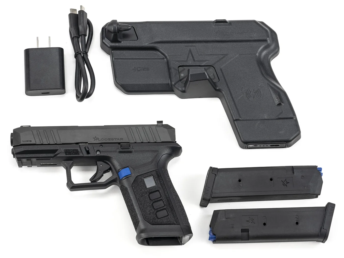 The complete LodeStar LNK9 kit — firearm, charging dock, and magazines.